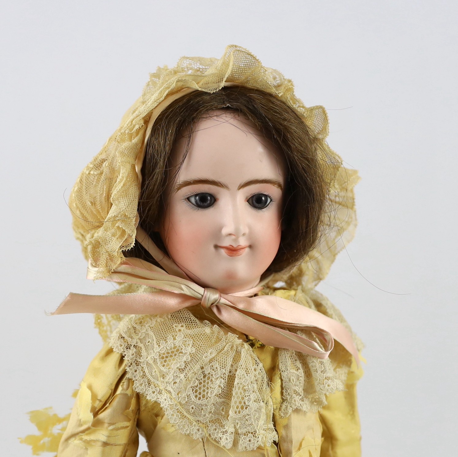 A Bru bisque swivel head fashion doll, French, 1870, 20in.